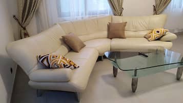 Comfort Apartment | Living area | Flat-screen TV