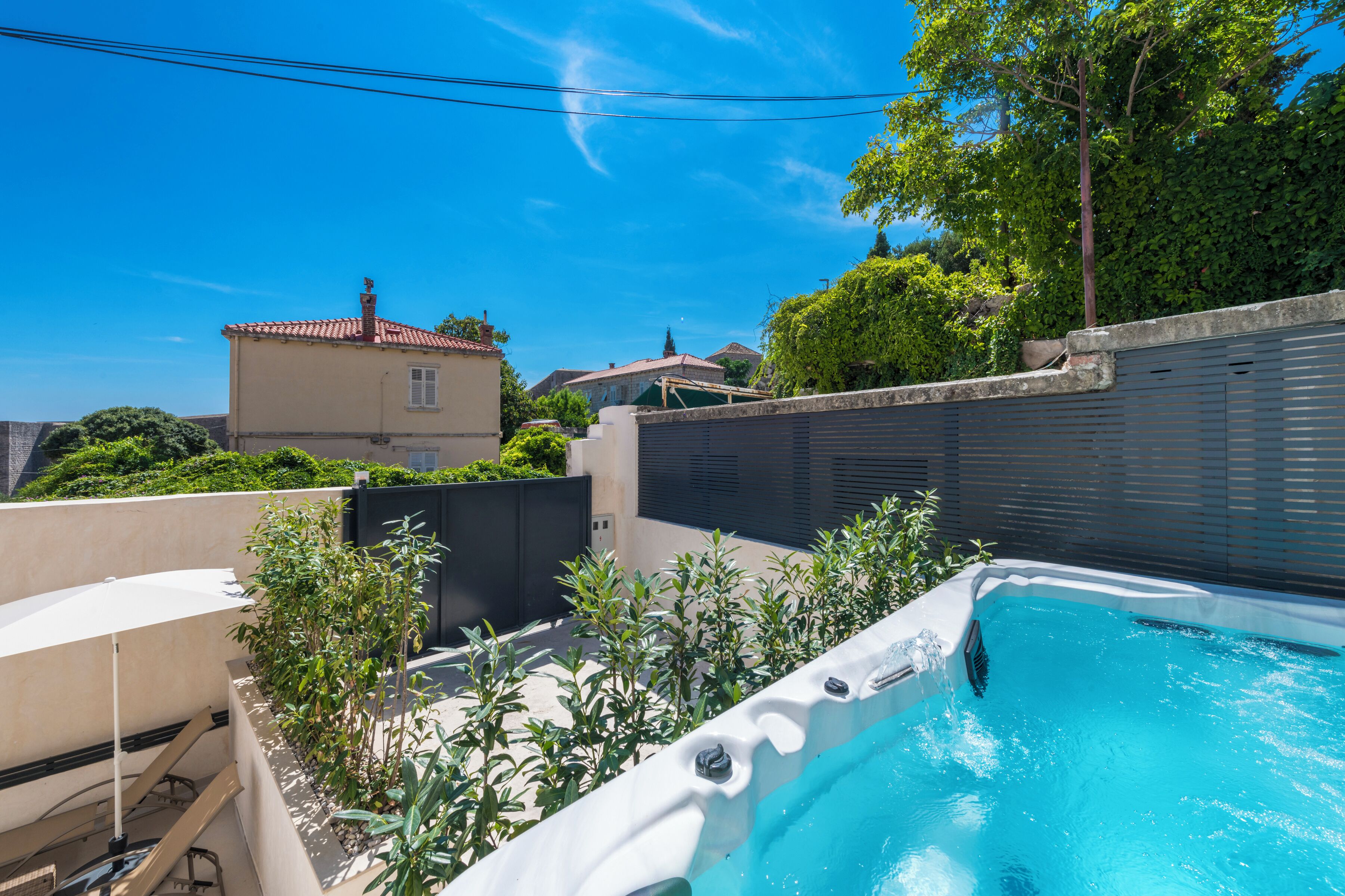 Seasonal outdoor pool, pool umbrellas, sun loungers