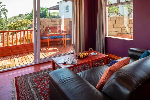 Living area - ENTIRE cozy farm resort with a ocean view right out side your terrace W/4 BDRM
(Cape Town)