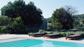 Outdoor pool, pool umbrellas, sun loungers