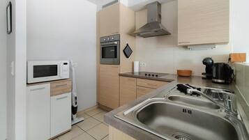 Réfrigérateur, four, plaque de cuisson, lave-vaisselle