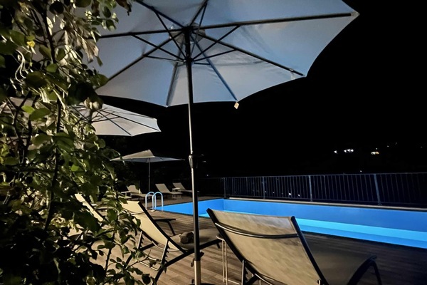 Seasonal outdoor pool, pool umbrellas, pool loungers