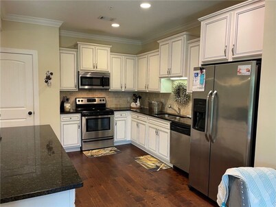 Absolutely a stunning townhome. With everything you will need 