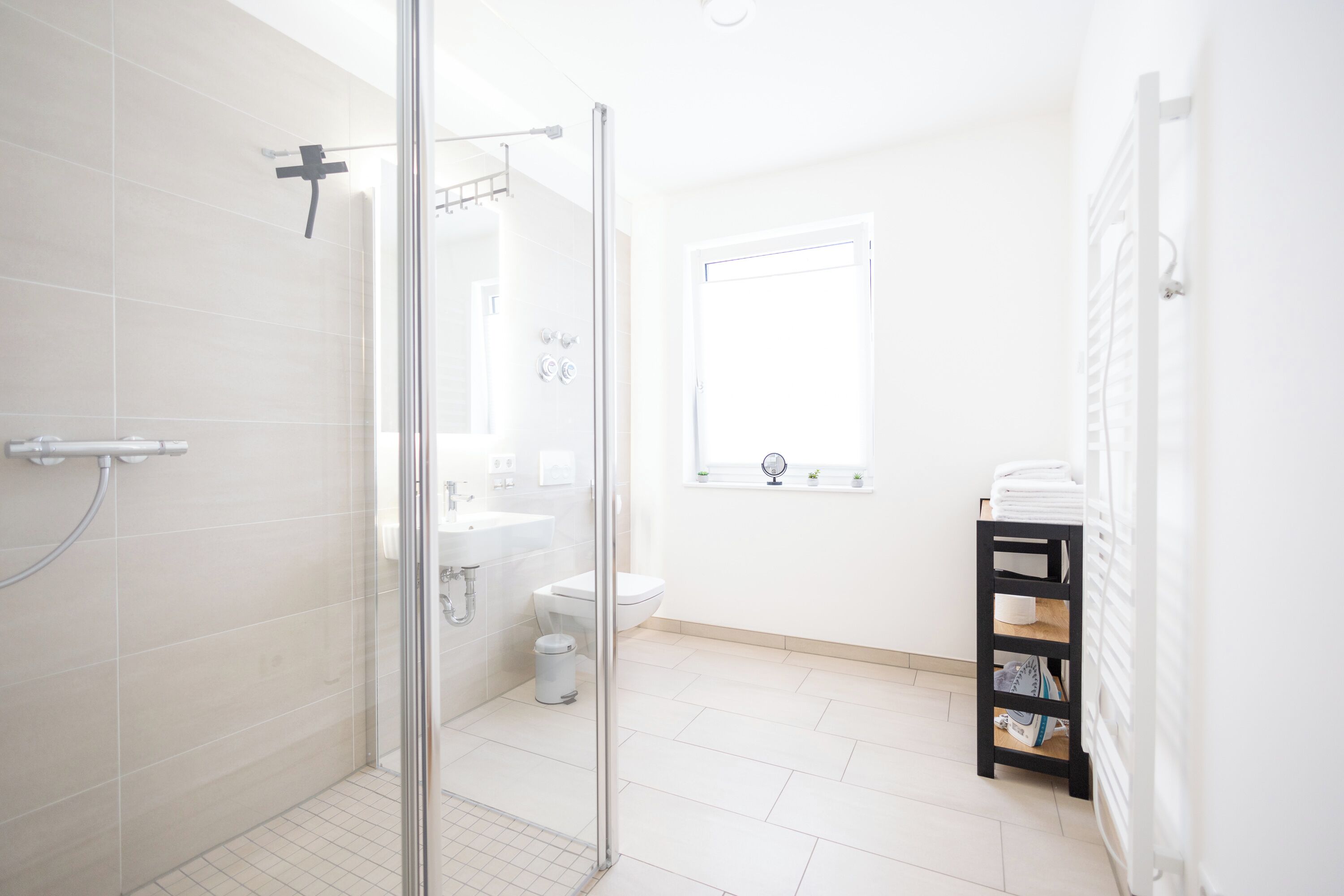Shower, eco-friendly toiletries, hair dryer, towels