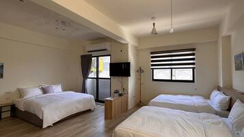 Family Suite, Multiple Beds | Down comforters, bed sheets