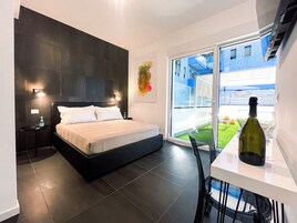 Deluxe Double Room | In-room safe, individually decorated, desk, iron/ironing board
