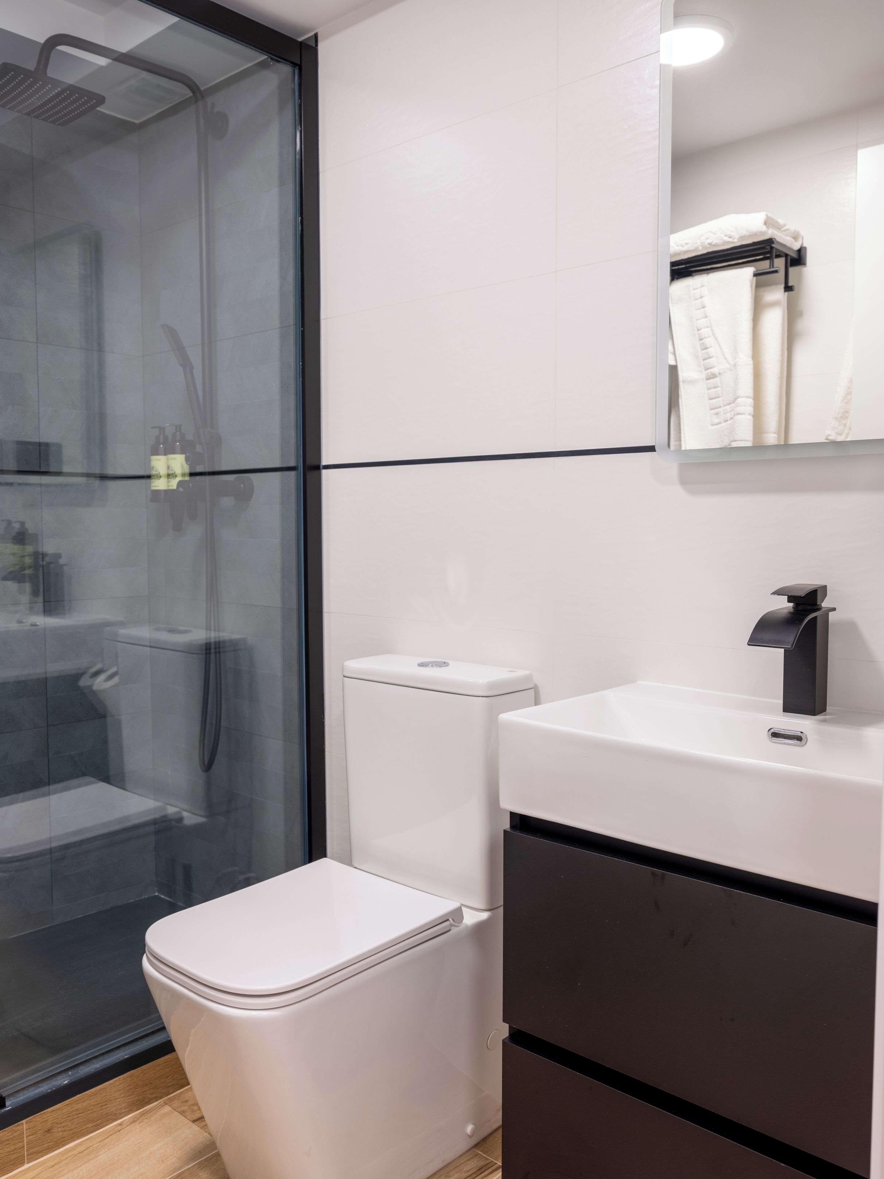 Exclusive Studio | Bathroom | Shower, hair dryer, towels