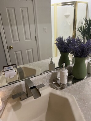 Jetted bath, towels, soap, toilet paper