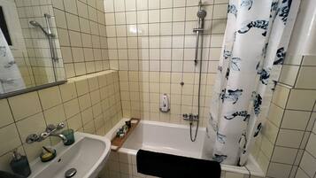 Hair dryer, towels, soap, shampoo