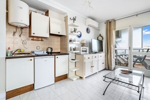 Fridge, microwave, coffee/tea maker, electric kettle