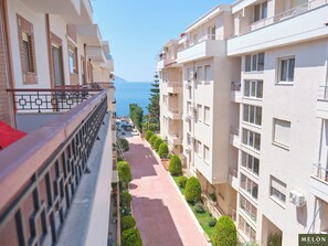 Departamento panorámico, 1 habitación, vista al mar | Terraza o patio