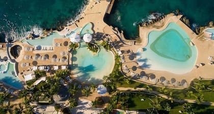 Cozy Apartment with 24/7 pool - 5-10 min walk to Beach, Clubs, activities!