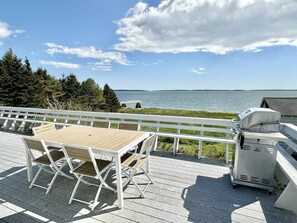 Outdoor dining - 4 BR Big Waterfront Home w/ Beach! [Coastal Haven] (Tremont)