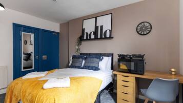 1 bedroom, desk, iron/ironing board, travel cot