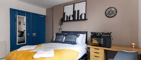 1 bedroom, desk, iron/ironing board, travel cot