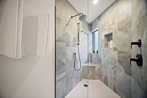 Shower, hair dryer, towels, soap