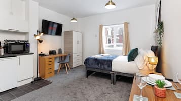 1 bedroom, desk, iron/ironing board, travel cot