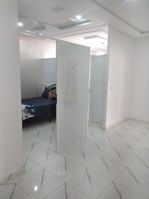 Luxury Room | Living area | Smart TV, video game console, DVD player, iPod dock - Sweet Home (Deroua)