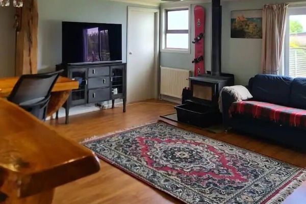 Family House | Living area | 55-inch Smart TV with digital channels