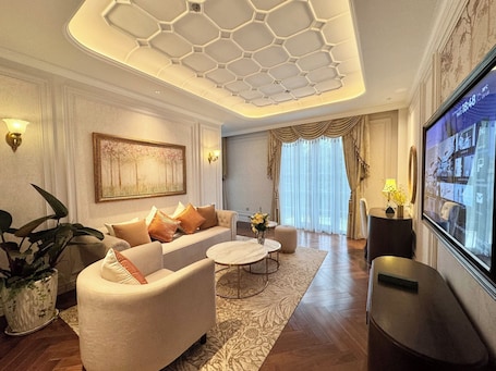 Premier Suite | Minibar, in-room safe, desk, laptop workspace. Golden Sun Hotel - Dalat