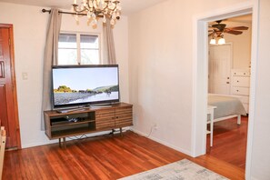 1 bedroom, desk, iron/ironing board, travel cot