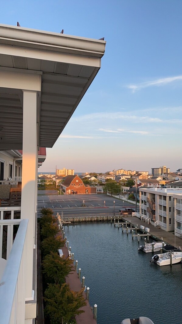 Enjoy breathtaking views of the water and city from your balcony.