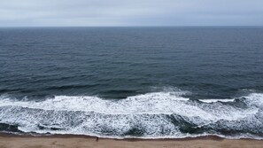 Enjoy the serene ocean views and expansive beach.
