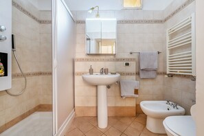 Family Apartment, 2 Bedrooms (Terra Mia In The Historic Center Of) | Bathroom | Shower, hair dryer, bidet, towels