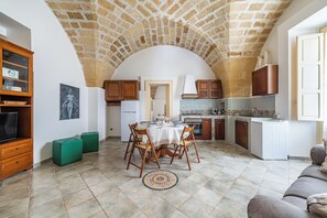 Family Apartment, 2 Bedrooms (Terra Mia In The Historic Center Of) | Living area | 21-inch TV with cable channels