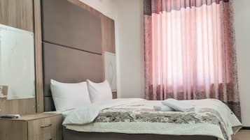 Habitación doble Deluxe | Escritorio, wifi gratis y ropa de cama