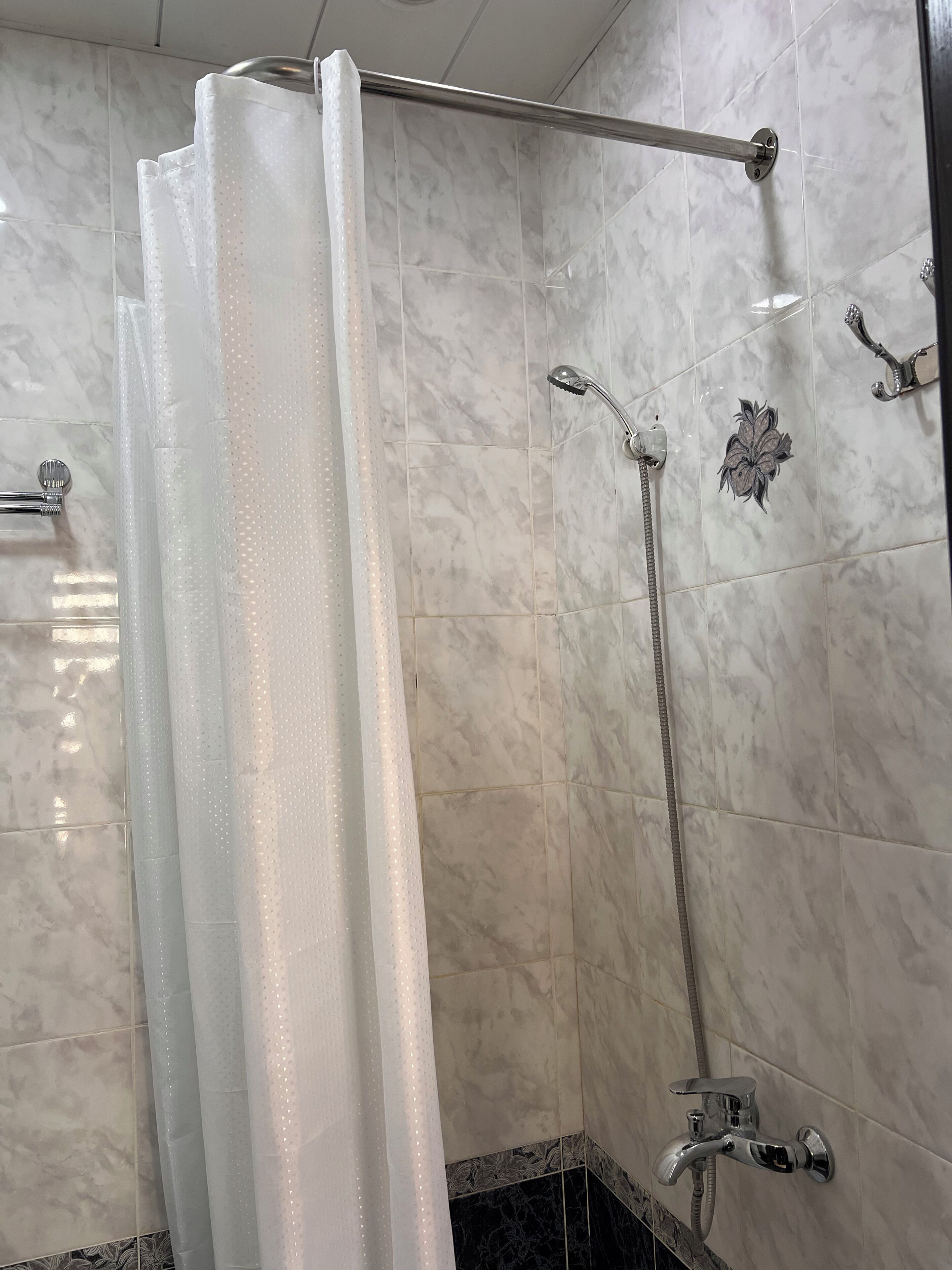 Rainfall showerhead, hair dryer, towels, soap