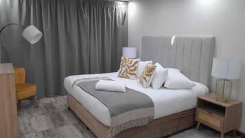 Individually decorated, desk, laptop workspace, blackout drapes
