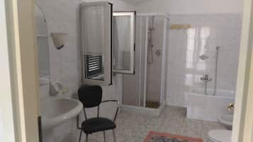 Bathtub, hair dryer, towels
