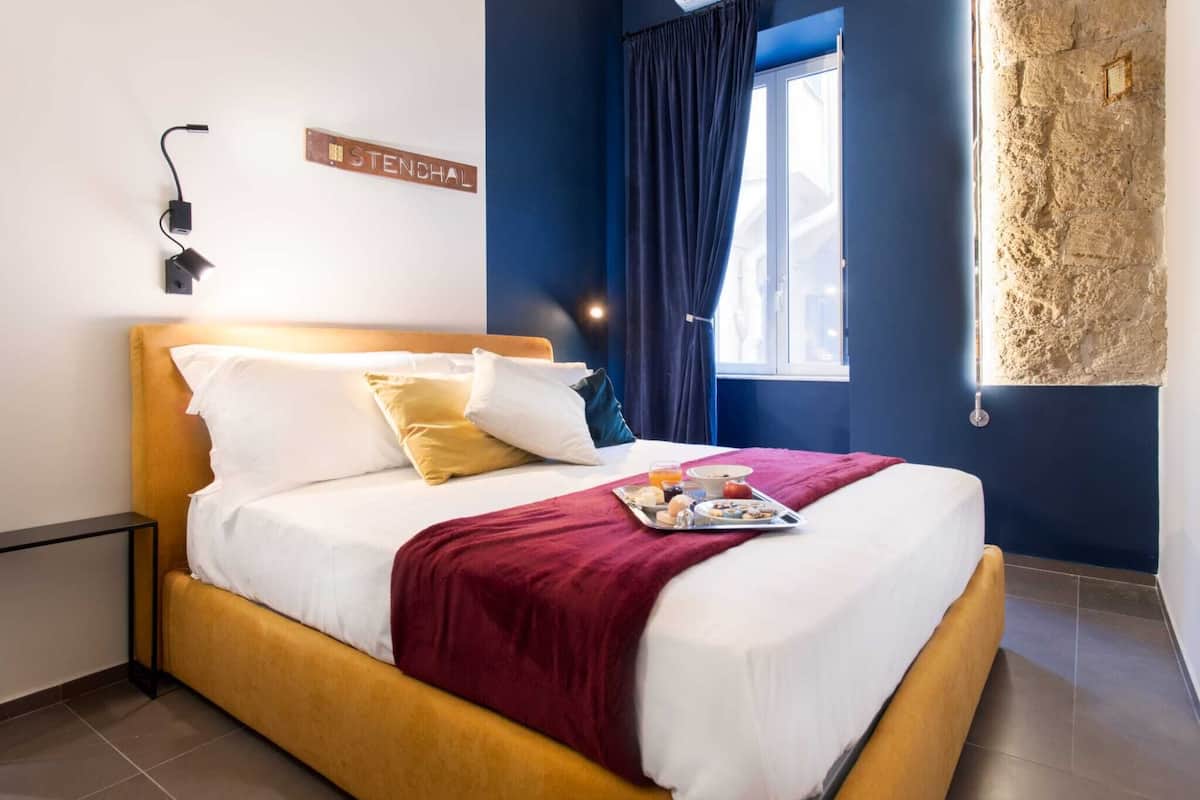 Suite Junior | 1 kamar tidur, brankas, tirai kedap cahaya, dan kedap suara