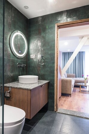 Shower, rainfall showerhead, designer toiletries, hair dryer