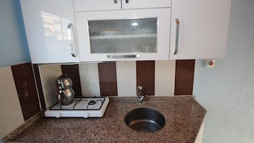 Fridge, stovetop, paper towels, kitchen islands