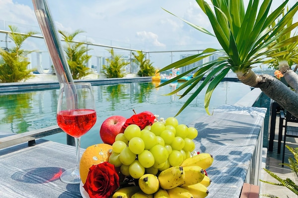 Outdoor pool, open 6:30 AM to 6:00 PM, pool umbrellas