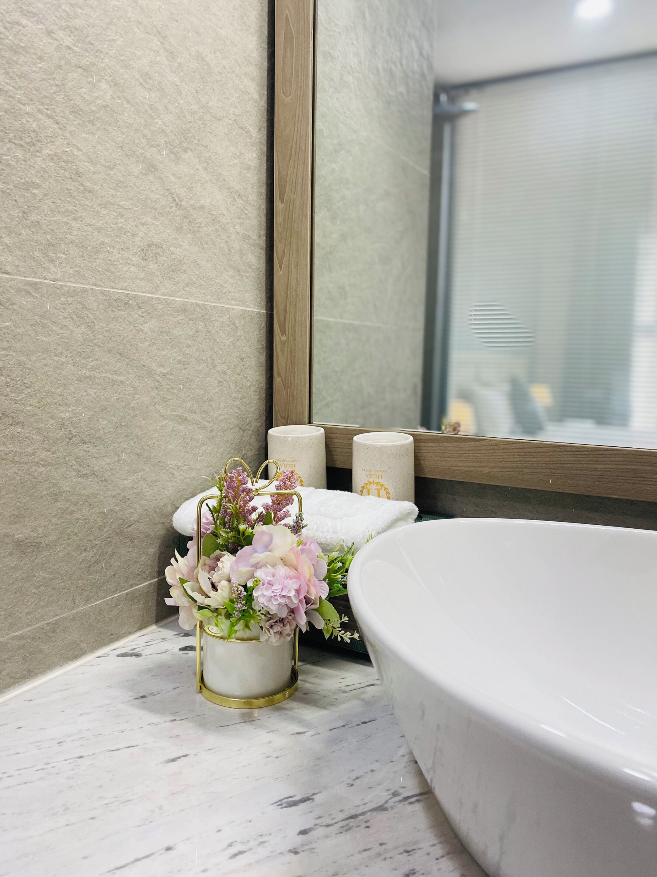 combined shower/bathtub, rainfall showerhead, designer toiletries