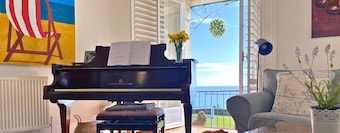 At present there are some exterior works being carried out with some minor obstructions to the view and some works to the exterior Mon-Friday between 9am-4pm daily on the top of the building.