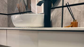 Shower, bidet, towels, soap