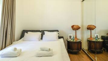 1 bedroom, desk, iron/ironing board, bed sheets