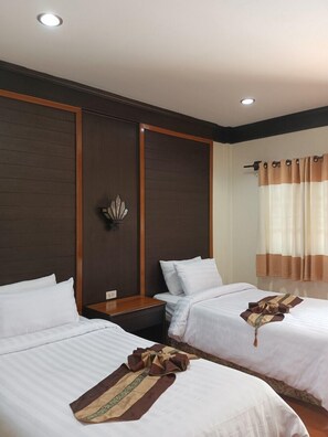 Chambre Deluxe avec lits jumeaux | Accès au Wi-Fi (inclus)
