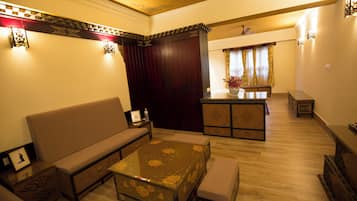 Vajra Suite with Bathtub | Living area | Flat-screen TV
