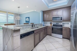 Condo, 2 Bedrooms | Private kitchen | Fridge, oven, coffee/tea maker