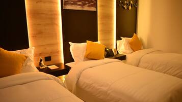 Standard Triple Room | 1 bedroom, desk, laptop workspace, blackout curtains