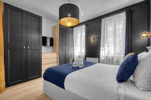 2 dormitorios, tabla de planchar con plancha, wifi gratis y ropa de cama