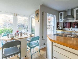 Fridge, microwave, oven, stovetop - Coach House - Duplex cottage style apt w/ patio (Ramsgate)