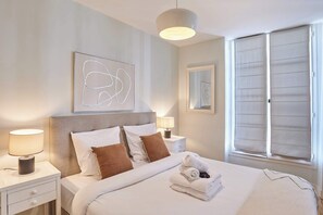 Iron/ironing board, travel crib, free WiFi, bed sheets