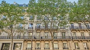 A multi-story building with classical architecture, featuring balconies with wrought iron railings and large windows. - New and Exceptional apartment Madeleine/Concorde (Paris)