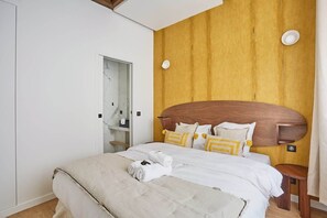 2 slaapkamers, een strijkplank/strijkijzer, gratis wifi, beddengoed